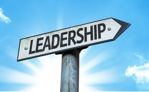 Leadership sign with sky background