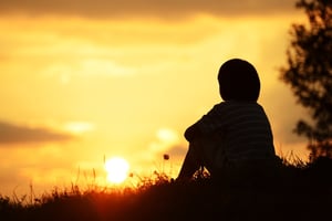 Little boy spending happy time on summer nature