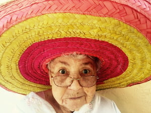 elderly.woman.sombrero.unsplash